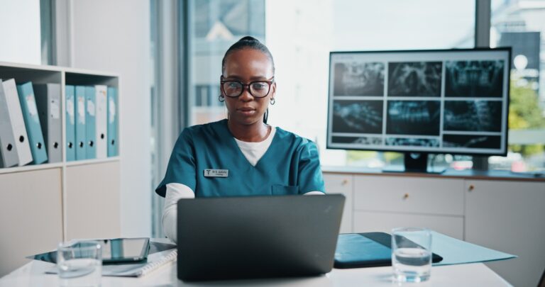 Black woman, doctor and check laptop at hospital of xray study, lab results and schedule update. Pe