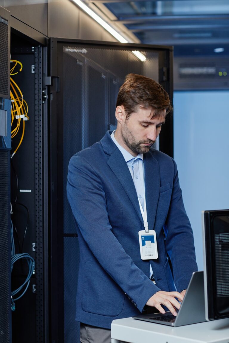 Male Network Engineer Setting Up Server
