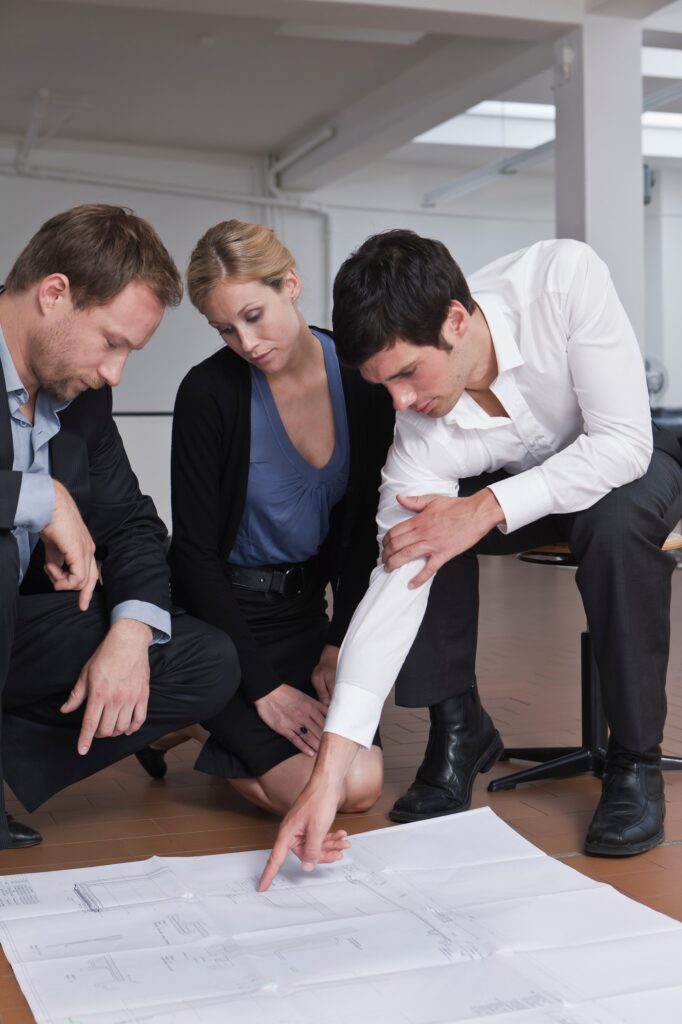 Business team reviewing specifications