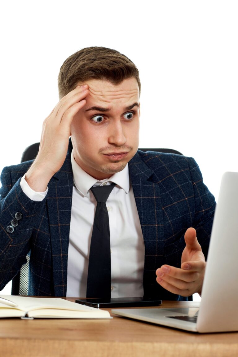 businessman using laptop having problems thinking about troubles