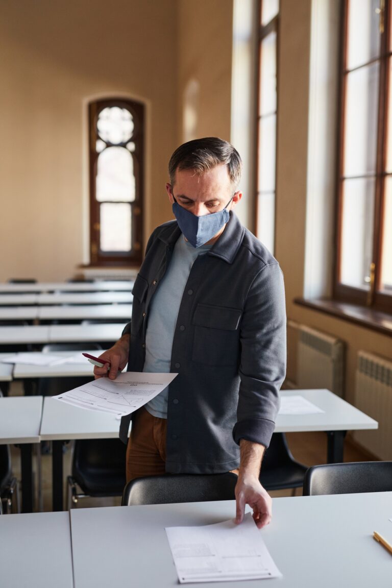 College professor wearing mask at work