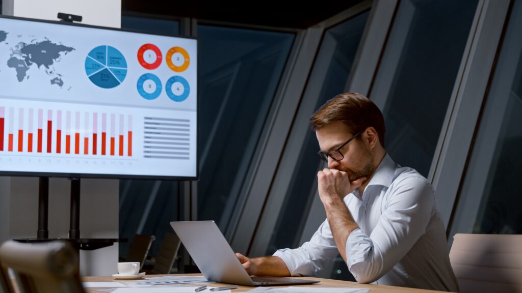 Working corporate leader using computer technology
