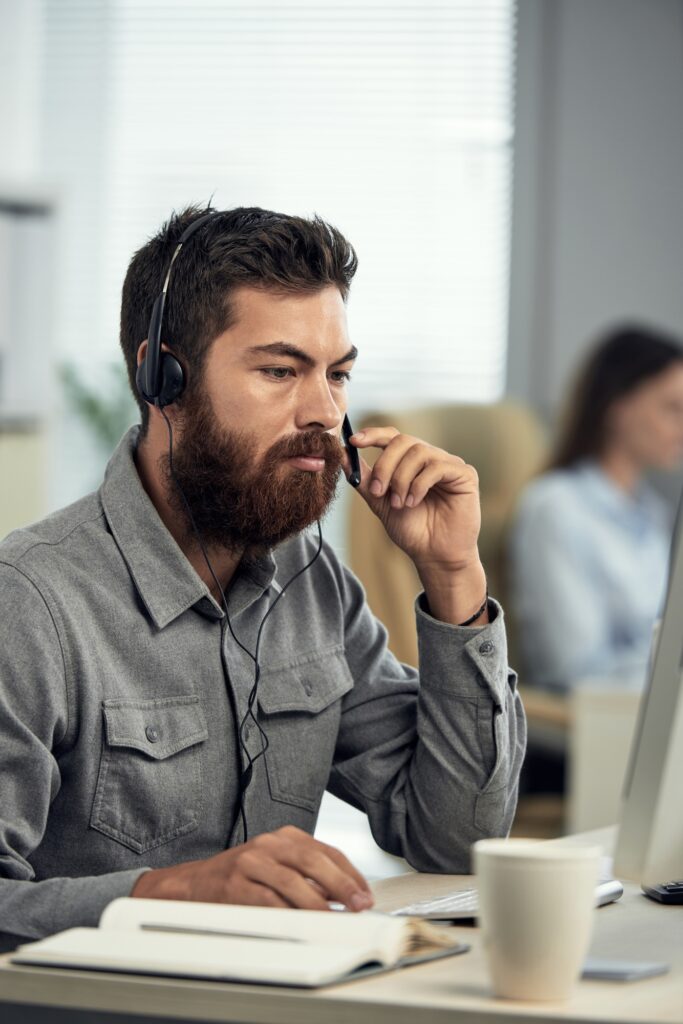 Bearded Call Center Operator