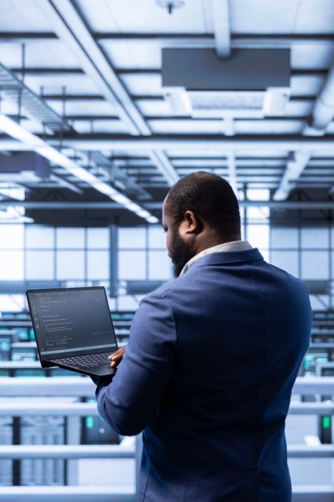 Data center manager ensuring safety and security of database using notebook
