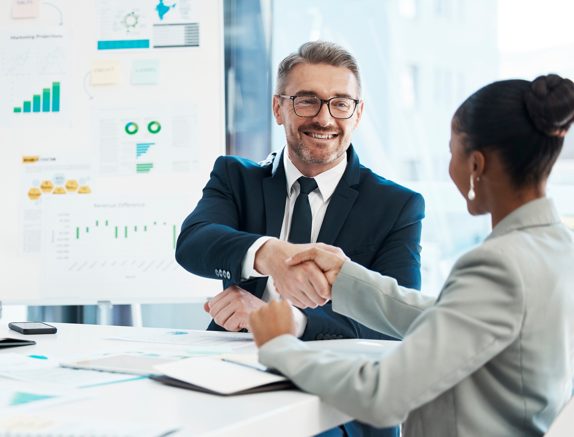 Formal, corporate meeting and handshake or business deal between workers. Partnership, trust and pr