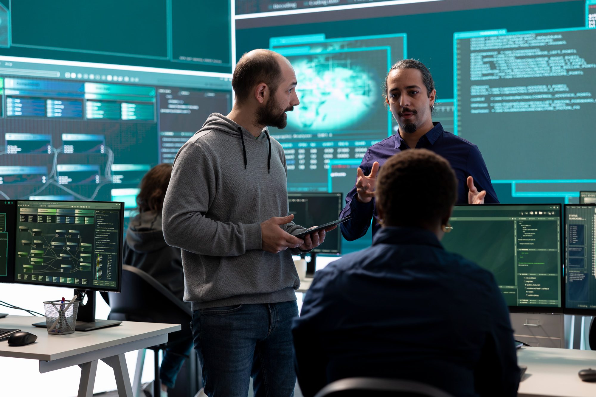 Cyber security team conducting cyber surveillance in a governmental control room
