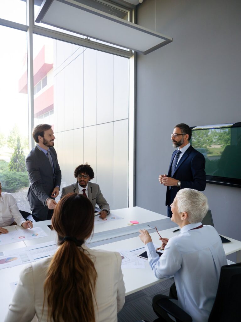 Corporate business team and manager in meeting. Business, people, teamwork concept
