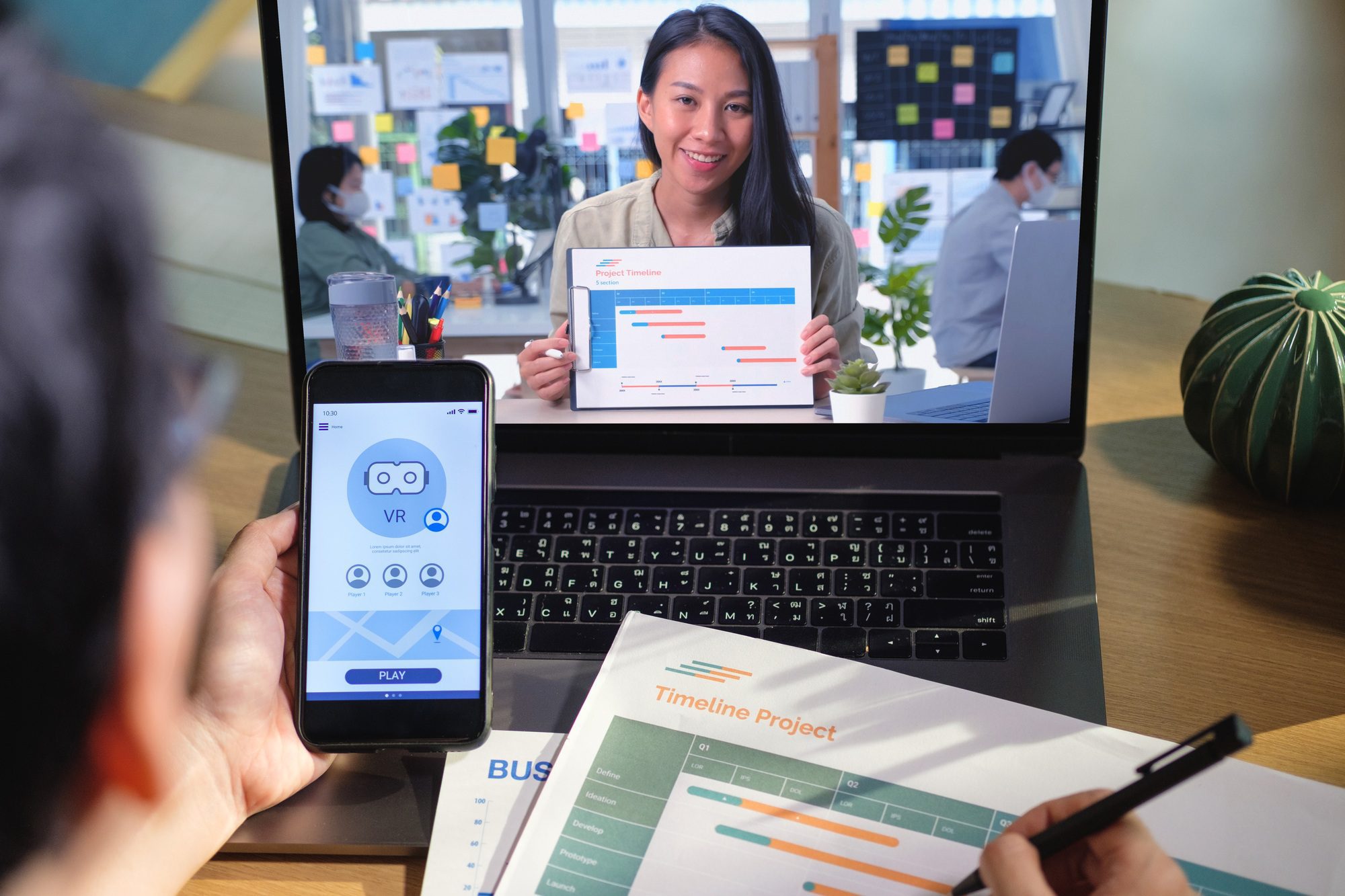 developer asisn woman video conference ux ui design meeting online with laptop at home