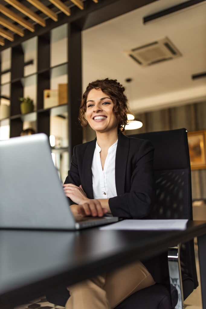 Portrait of a happy businesswoman having online meeting.