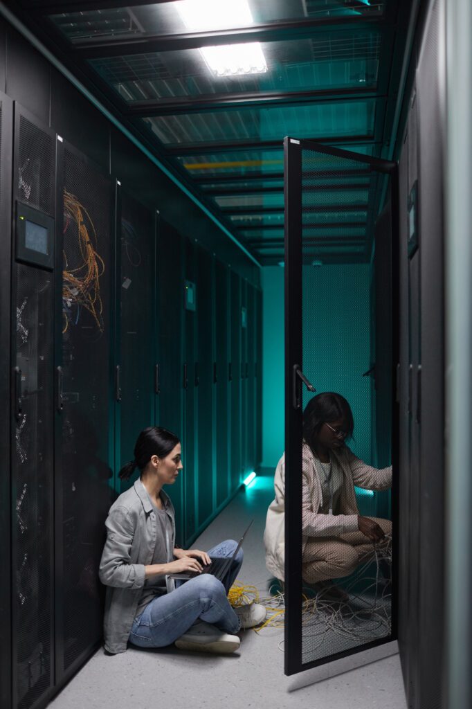 Young Women Working in Data Center